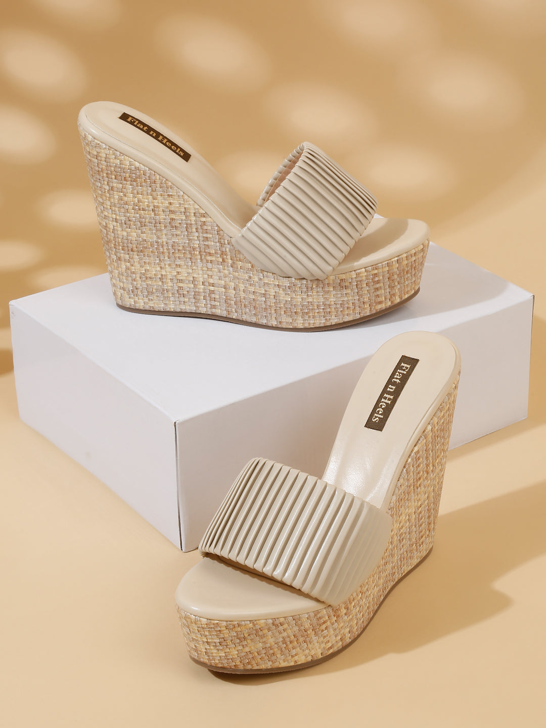 Stylish Beige Wedge Sandals with Textured Straps